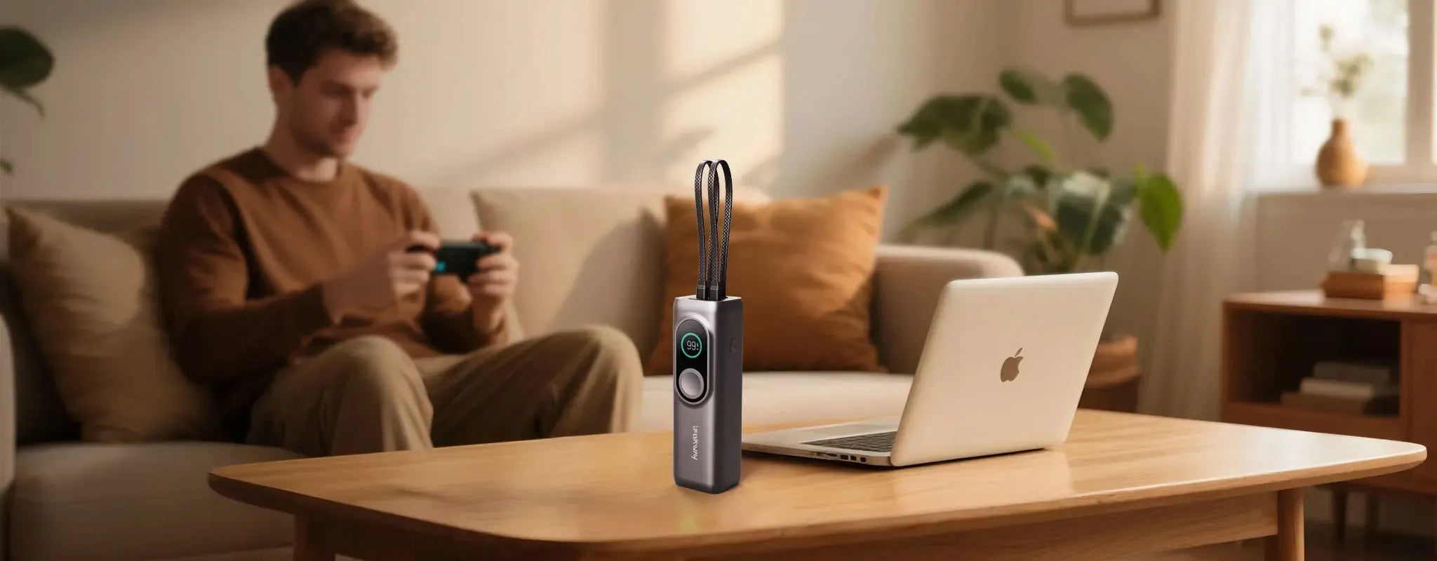 A wide lifestyle banner featuring the iFORWAY 25000mAh 170W power bank on a coffee table. With its massive 170W total output and dual built-in 100W cables, it’s the ultimate charging solution for MacBooks and gaming consoles like Steam Deck or Nintendo Switch, perfectly blending into a modern home office or leisure setup.