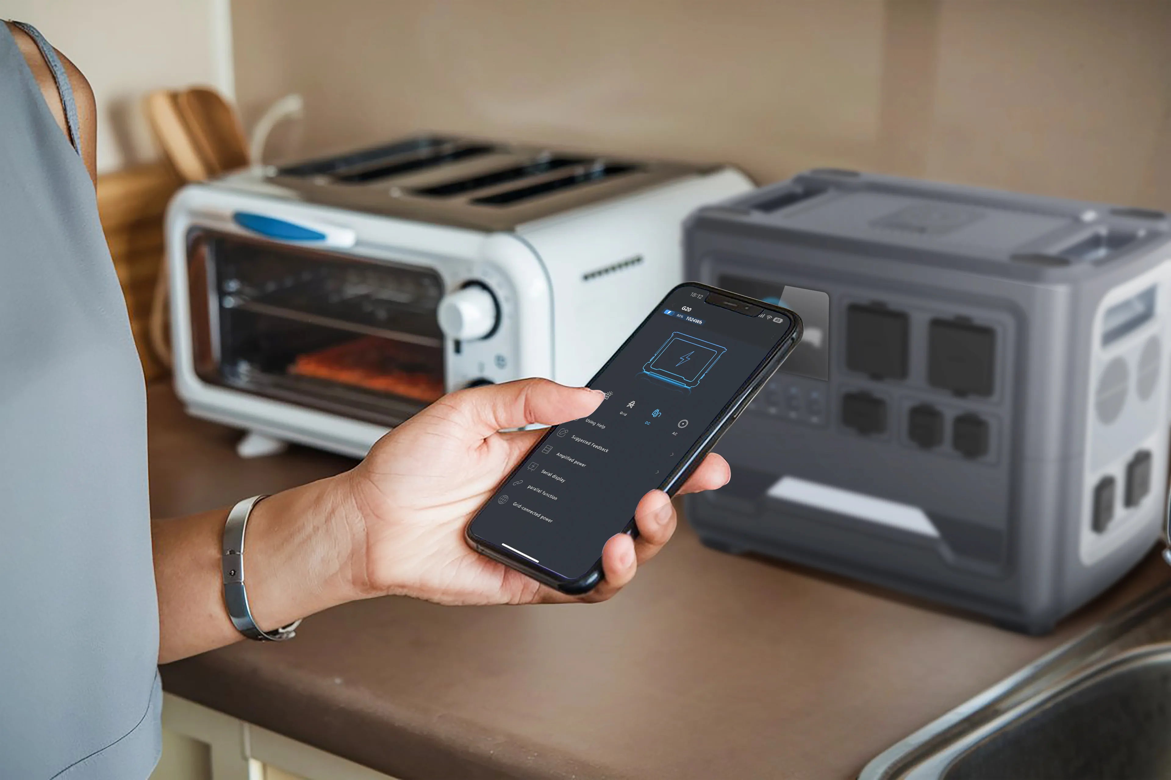 iFORWAY smart energy hub featuring remote app control in a kitchen setting. Monitor your high power output and battery status in real-time via smartphone while powering household appliances. Engineered as a dependable home backup power solution, it ensures stable performance and superior safety for all your electronic needs. This Built Tough station is the ultimate digital center for off-grid living, delivering Power On the Go with intelligent energy management and low heat loss technology.